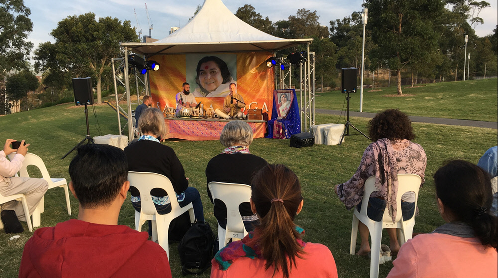 Music vibrations sooth the seekers of Sydney from the Barangaroo Park public program.